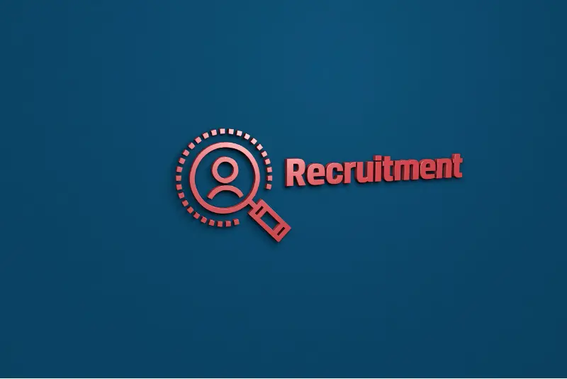 Magnifying lens highlighting the word ‘Recruitment’ – symbolizing focus and precision in hiring