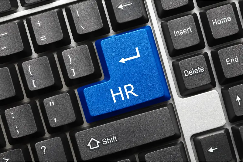 Keyboard Enter key labeled HR – symbolizing the entry point to hiring through human resources